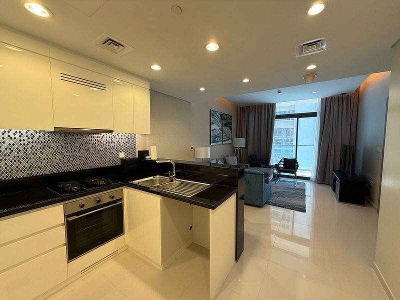 Aykon City living room — 1 bedroom apartment for sale Business Bay Dubai